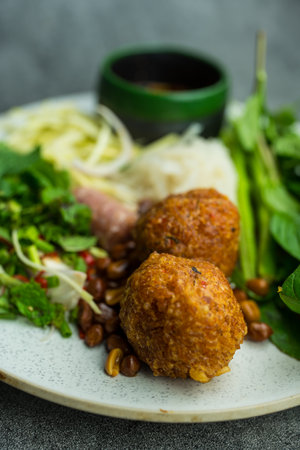 Fermented pork and crispy rice salad, Yam Naem Khao Tod, Thai street foodの写真素材