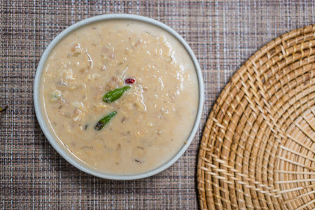 Soy bean in coconut milk dipping sauce. Herbed soya beans with minced pork in coconut milk garnish...