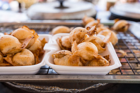 Coconut rice pancake kind of Thai sweetmeat, Kanom Krok in foam boxの写真素材