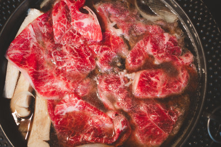 Marble fresh raw beef in hot soup. Japanese style is popular local food in asian countries.