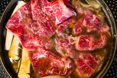 Premium fresh raw wagyu beef in hot soup. Japanese style is popular local food in asian countries.の写真素材