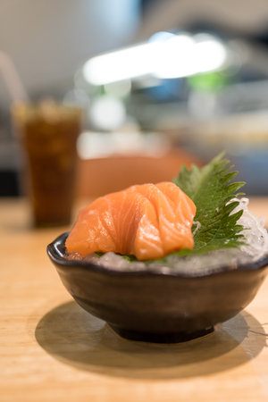 Salmon sashimi slice fresh serve on ice, seafood healthy organicの写真素材