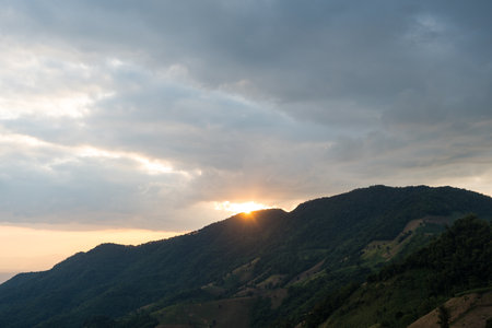 Beautiful landscape mountain with sunset at Na Noi District, Nan Province, Thailandの写真素材