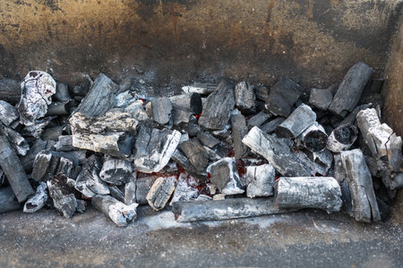 Close up of charcoal on barbecue grillの写真素材