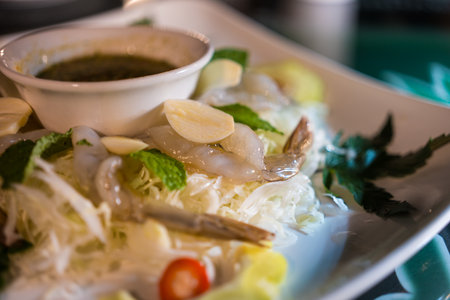 Raw shrimp with Thai spicy seafood dipping sauceの写真素材