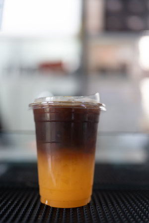 Tasty refreshing drink with coffee and orange juice, refreshing drink for summer enjoymentの写真素材