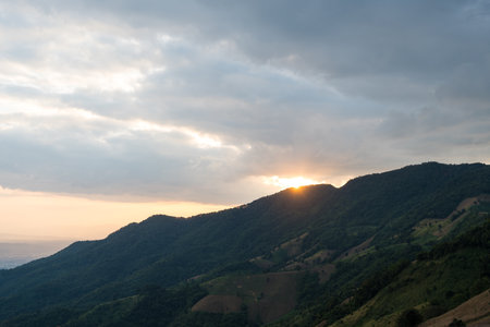 Beautiful landscape mountain with sunset at Na Noi District, Nan Province, Thailandの写真素材