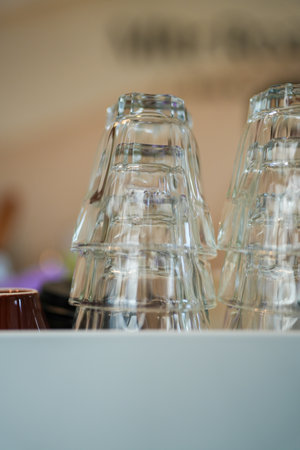 Clean drinking glasses lie upside down on a surface.の写真素材