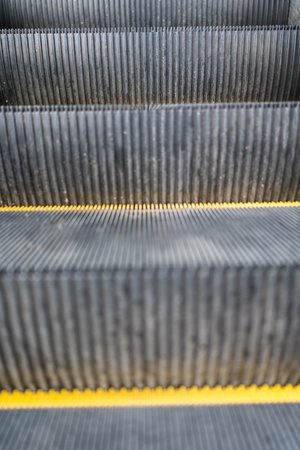 Close up to escalator yellow steel line.の写真素材