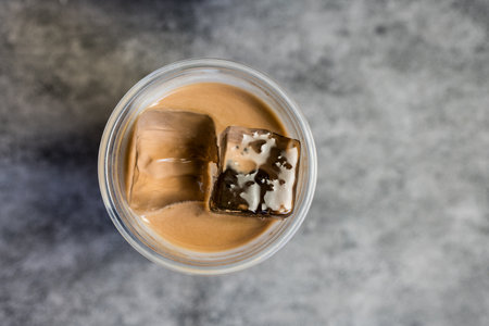 Iced Mocha coffee with ice cubes, top view