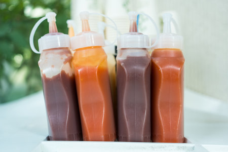 Chili Sauce and tomato sauce in plastic bottle for customerの写真素材