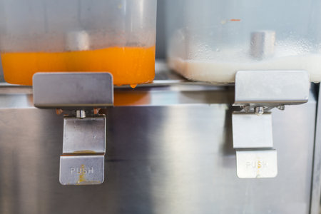 Closeup shot of orange juice and fresh milk buffet breakfast.
