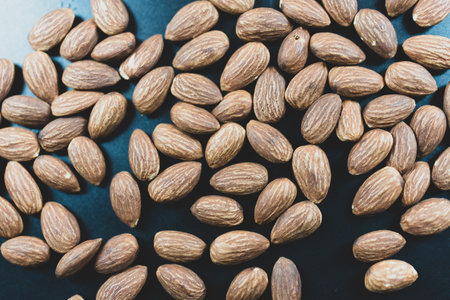 Close up of almond nuts. almond kernels for background or textureの写真素材
