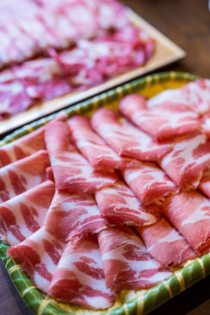 Close up shot of sliced pork for shabu shabu hot potの写真素材