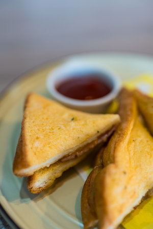 Handmade sandwiches on garlic bread triangles, close upの写真素材