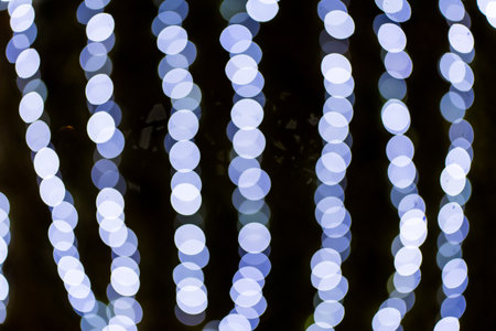 Defocused lights background, illumination and decoration concept. Blue Background