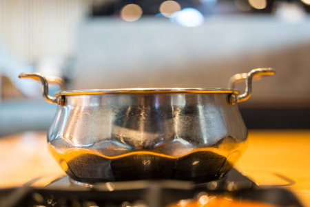 Hot of cooking pot for Shabu shabu is a Japanese of thinly sliced meat and vegetables boiled in water.の写真素材