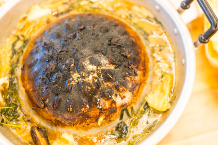 Grill pan is full of foods stains. Grill Thai grilled BBQ on pan street buffet thai style, selective focus. Meal concept.の写真素材