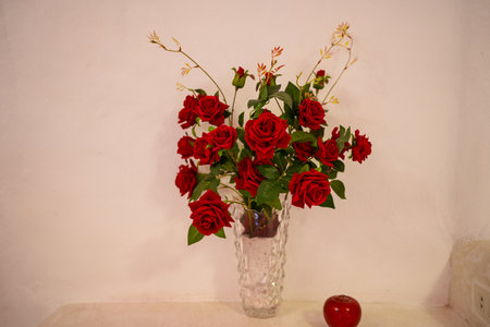 Beautiful bouquet of roses in a glass vaseの写真素材