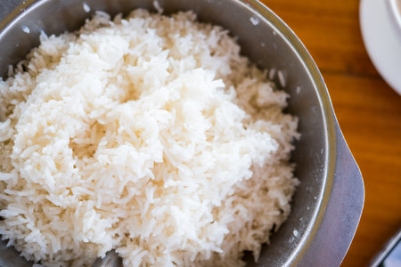 Cooked white rice or steamed rice in bowl at Thai restaurantの写真素材