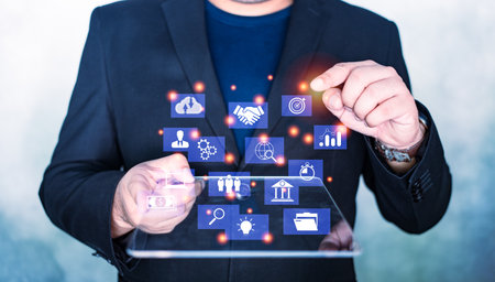 Businessman touches a global internet connection application technology and digital marketing. Financial and banking. Digital link tech and big data.の写真素材