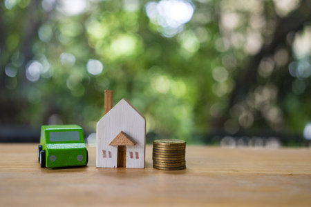 Concepts of asset for purchasing a car and a house. Ideas for saving when buying a home.の写真素材