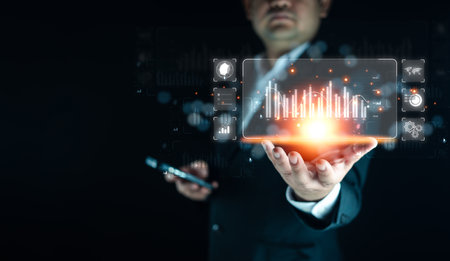 Business person analyzing financial graphs on a virtual screen, data-driven decision making concept, digital marketing strategy planning, customer relationship managementの写真素材