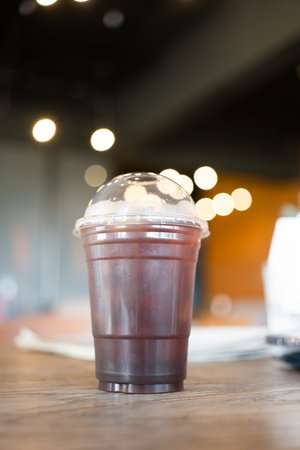 Iced Americano served on wood table.の写真素材
