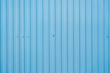 Blue corrugated metal wall surface, metal background and texture surface or galvanized steelの写真素材