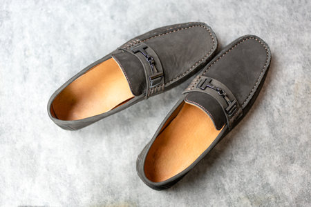 Pair of dark brown modern loafers. Top viewの写真素材