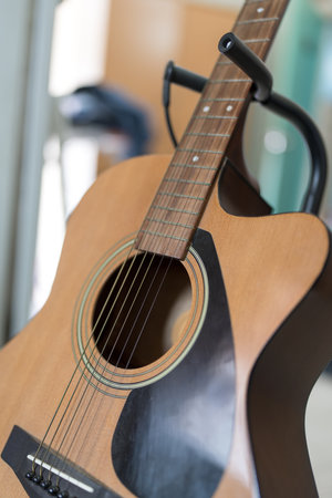Brown acoustic guitar. Close upの写真素材