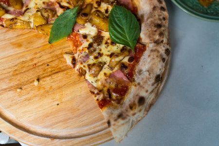 Delicious Hawaiian pizza slice. Top view