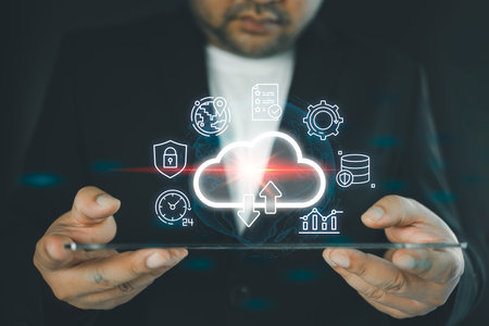 Businessman holding cloud technology with digital data and icons of network connection. Productivity...