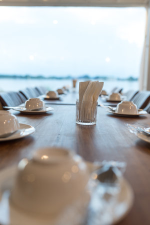 Table setting for the event. Unoccupied table in the cozy restaurantの写真素材