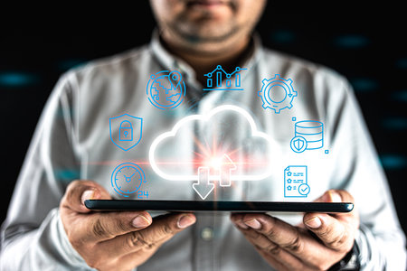 Productivity and automation strategy for business success. A businessman hand showing a cloud...