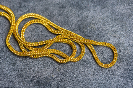 Gold necklace fashion jewelry. Top viewの写真素材