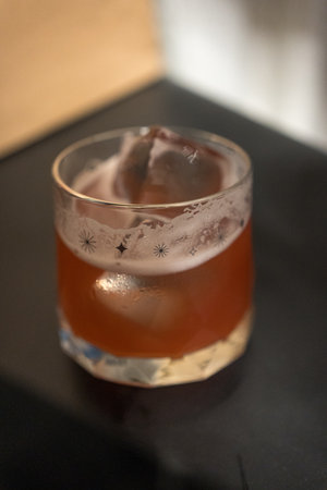 A glass of fruit beverage with ice. Close upの写真素材