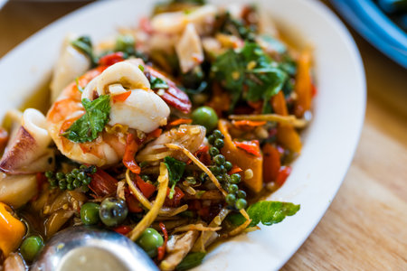 Thai stir fried spicy seafood served on dish. Thai called Pad Cha Talayの写真素材