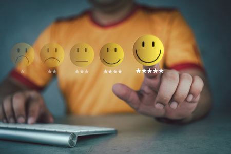 Review and feedback man to give smile face and five stars for excellent evaluation survey after client use product and service from customer satisfaction concept.の写真素材