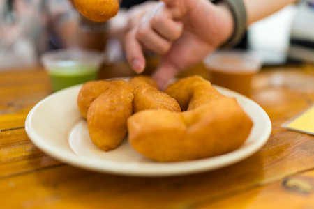 A popular Thai breakfast food made from deep fried dough sticksの写真素材