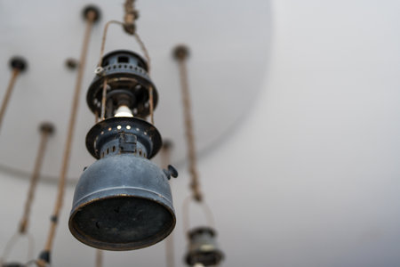 A vintage lamp hanging from the ceiling.