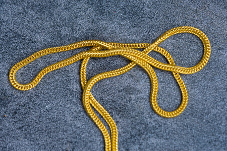 Elegant gold necklace. Top viewの写真素材