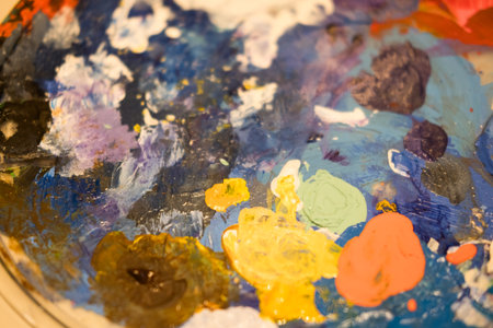 Palette with multi-colored spots of oil or acrylic paint. Abstract watercolor backgroundの写真素材