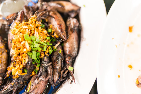 Squid stir-fried in black sauce, a popular Thai dish