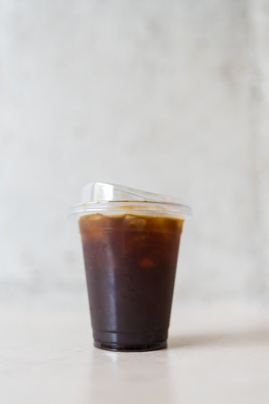 Cold filter americano coffee with ice on table