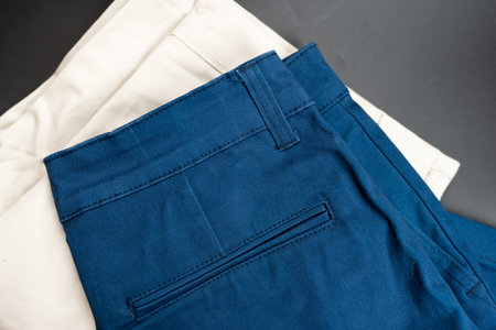 Folded blue showing the back pocket, folded in half. Top view