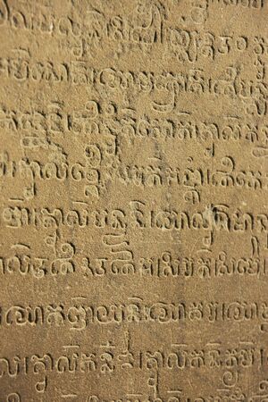 Close up of Khmer writing, interior wall of Prasat Kravan temple, Angkor area, Cambodiaの写真素材