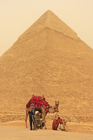 Bedouins resting near Pyramid of Khafre during sand storm, Cairo, Egyptのeditorial素材