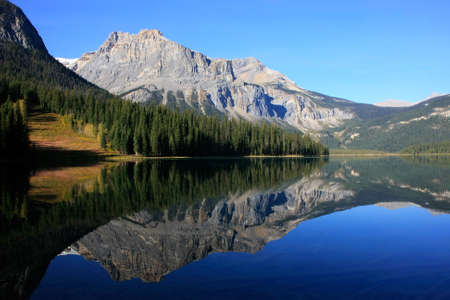 Mountains reflected in Emerald Lake, Yoho National Park, British Columbia, Canadaの写真素材