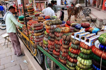 Indian man selling bangels at Sadar Market, Jodhpur, Rajasthan, Indiaのeditorial素材
